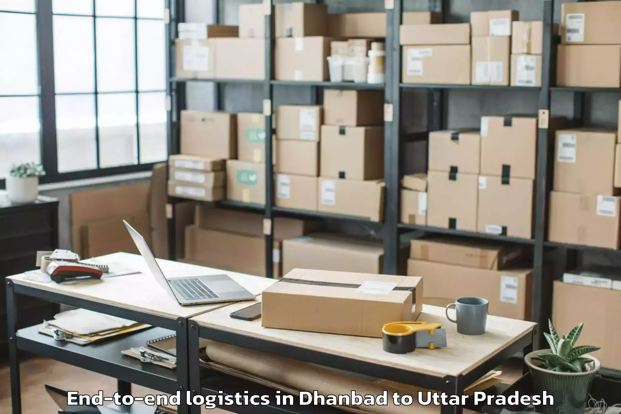 Trusted Dhanbad to Pukhrayan End To End Logistics